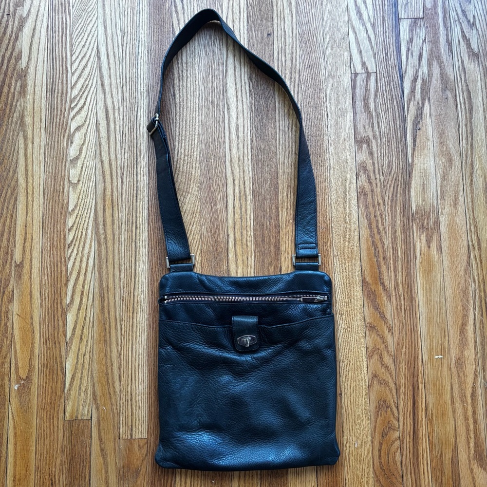 Genuine leather brown crossbody bag by Danier